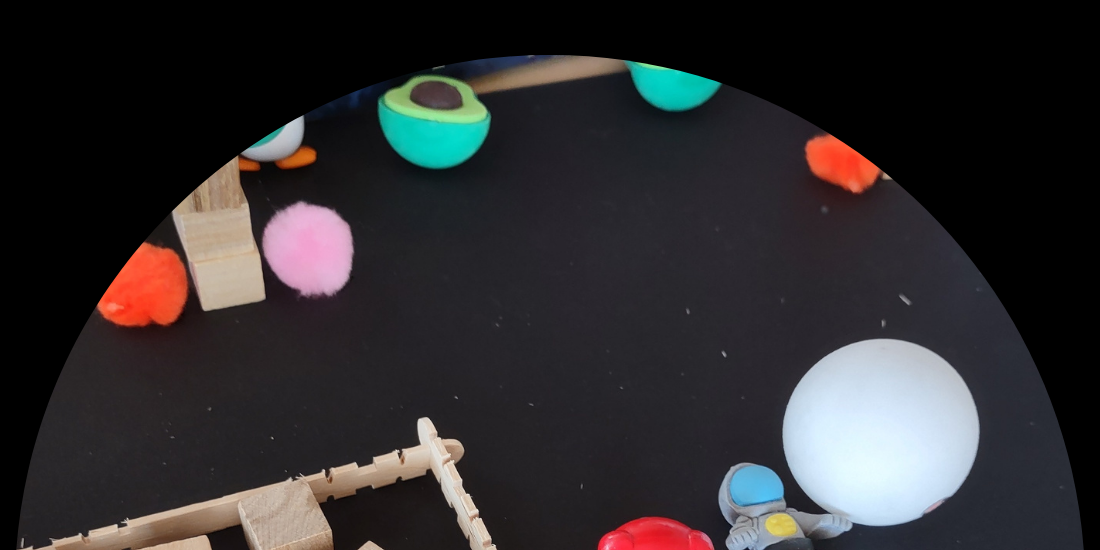 Game pieces on black paper