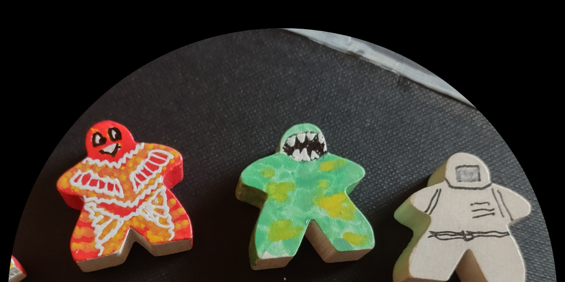 Three meeples
