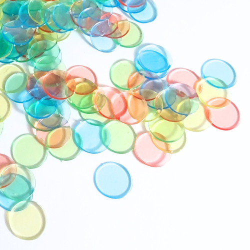Colorful round bingo pieces on a white background