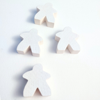 White wooden game meeples on a light gray background