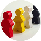 Colorful wooden meeples on a white background